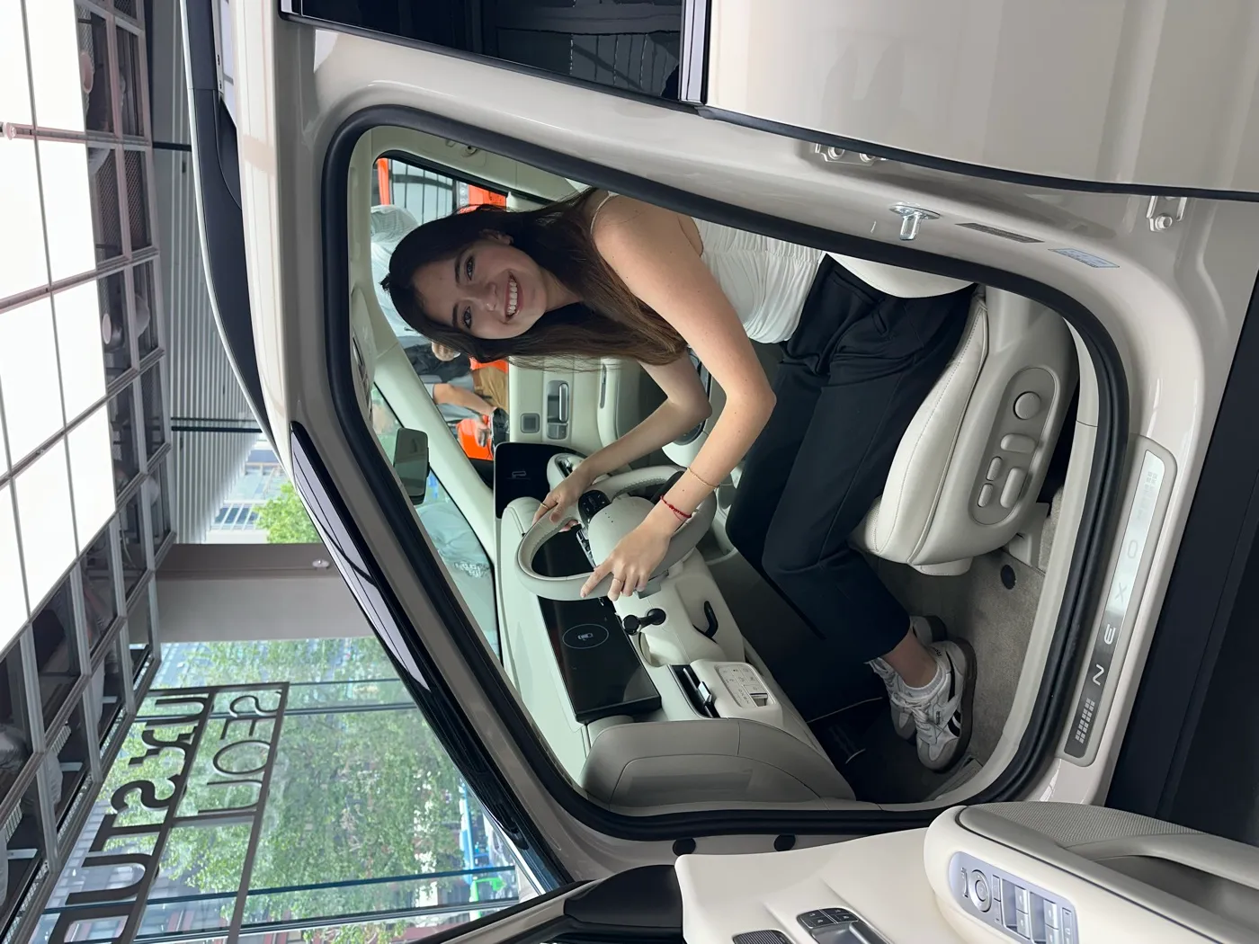 Daniela seated in a Hyundai NEXO during the company visit